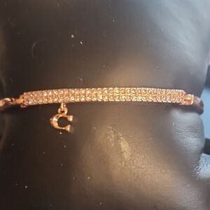 Elegant Gold Bracelet with Charm